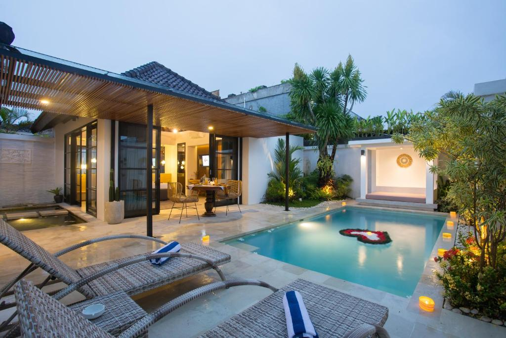Ubud villa with private pool at dusk